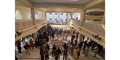 Security officials inspect the site of a mosque blast inside the police headquarters in Peshawar on January 30, 2023. (File photo | AFP)