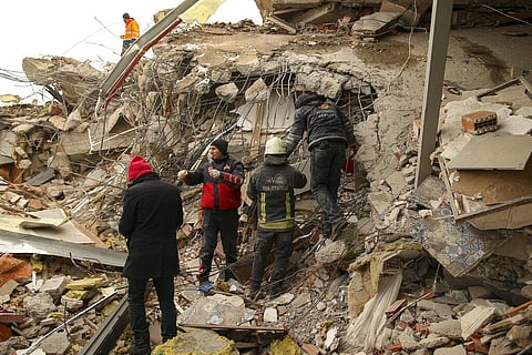 Rescue workers search for survivors on a collapsed building in Malatya, Turkey, Tuesday, Feb. 7, 2023. (Photo | AP)