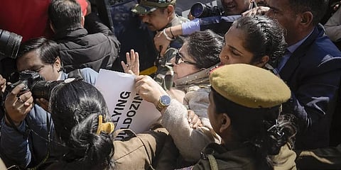Peoples Democratic Party (PDP) chief Mehbooba Mufti being detained by police personnel during a protest over the anti-encroachment drive across Jammu and Kashmir, near Boat Club in New Delhi | PTI