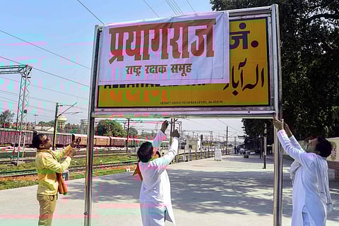 A file photo from Oct. 17, 2018, where people can be seen covering the Allahabad Railway Junction board with a poster of Prayagraj in Allahabad, Uttar Pradesh - (Photo | PTI).