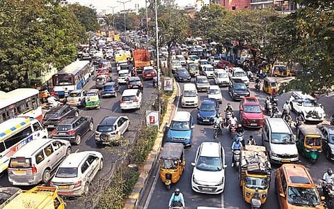 Commuters stuck in traffic on the road from Masab Tank to Secretariat in Hyderabad on Wednesday | Vinay Madapu