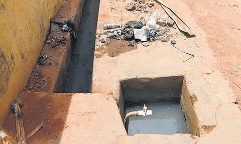 A view of drainage water pooling up beneath a drinking water tap at Edamalaipatti Pudur in Tiruchy on Thursday | m k ashok kumar