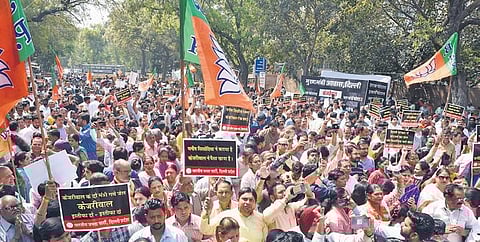 'Bharatiya Janata Party (BJP) supporters protest against Delhi government, at Rouse Avenue, in New Delhi on Friday. (Express Photo)
