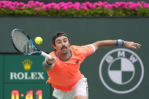 Jordan Thompson, of Australia, returns a shot to Stefanos Tsitsipas, of Greece, at the BNP Paribas Open tennis tournament Friday, March 10, 2023, in Indian Wells, Calif. (Photo | AP)