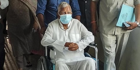 RJD chief Lalu Prasad Yadav arrives to appear before Rouse Avenue Court in connection with the land for jobs case, in New Delhi, March 15, 2023. (Photo | PTI )
