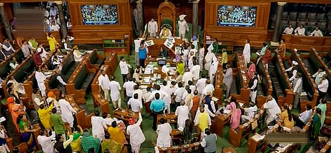 BJD's Bhartruhari Mahtab conducts proceedings in the Lok Sabha amid protests by opposition MPs. (Photo | PTI)