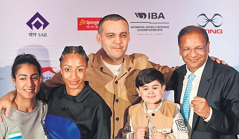 (from L) Boxers Sara Haghighat-Joo, Estelle Mossely with IBA president Umar Kremlev (C) and BFI chief Ajay Singh address the media on Tuesday. (Photo | BFI)