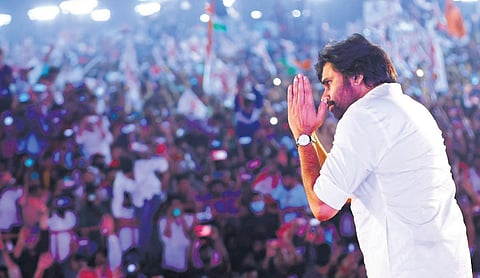 Jana Sena chief Pawan Kalyan greets people during the 10th party formation day in Machilipatnam | Express