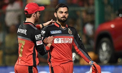 A file photo of former RCB Skipper Virat Kohli with teammate AB de Villiers. (Photo | PTI)