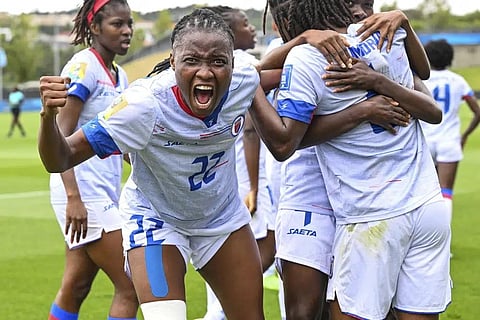 Roselord Borgella of Haiti celebrates a goal by teammate Melchie Dumonay during their FIFA women's World Cup qualifier against Chile in Auckland, New Zealand, Feb. 22, 2023. (Photo | AP)