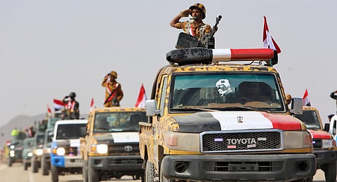 Photo shows fighters loyal to Yemen's Saudi-backed government taking part in a military parade marking the 56th anniversary of the 1962 revolution. (Photo | AFP)