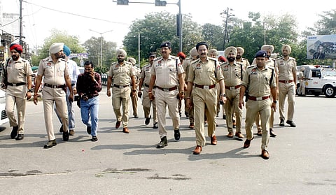 Punjab police conduct a flag march to prevent any untoward incident amid a search to nab Waris Punjab De chief Amritpal Singh, in Patiala on Sunday. (Photo | ANI)