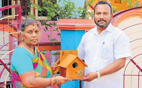 Sharavanan Krishnamoorthy giving away birdhouses to people to aid in the conservation of house sparrows | Express