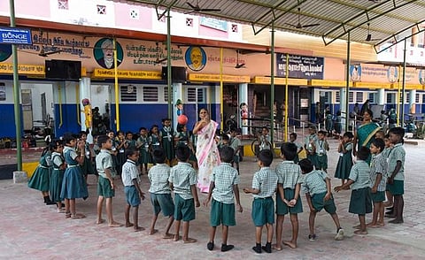 The newly installed roof and Smart TV on the corporation Government middle school campus for students in Tiruchy. MK Ashok Kumar