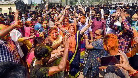 BJP supporters celebrate the party's lead during the counting of votes of the Tripura Assembly elections. (Photo | PTI)