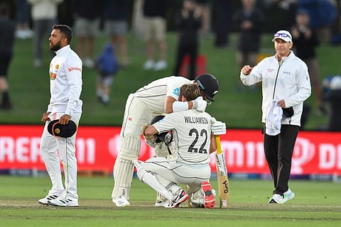 New Zealand's Neil Wagner (2L) hugs Kane Williamson. (Photo | AFP)