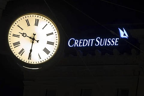 Illuminated windows are seen at the headquarters of Swiss bank Credit Suisse at Paradeplatz in Zurich, Switzerland, on Saturday, March 18, 2023. (Photo | AP)