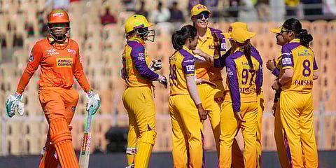 UP Warriorz bowler Anjali Sarvani with teammates celebrates the wicket of Gujarat Giants player Laura Wolvaardt during the WPL T20 cricket match at Brabourne Stadium in Mumbai. (Photo | PTI)