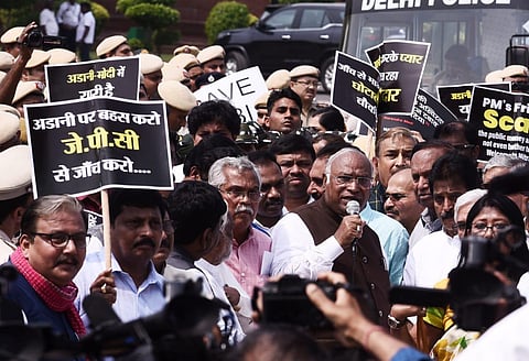 Opposition MPs march from Parliament to ED office to submit a memorandum over Adani issue, in New Delhi on Wednesday. (Photo | Parveen Negi, EPS)