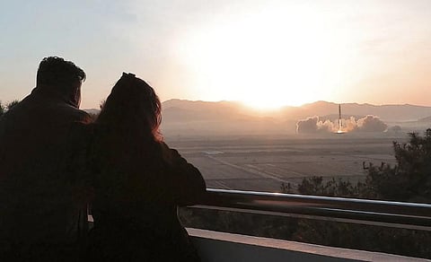 This picture taken on March 16, 2023 shows North Korean leader Kim Jong Un witnessing the launch of a Hwasong-17 intercontinental ballistic missile from Pyongyang International Airport. (Photo | AFP)