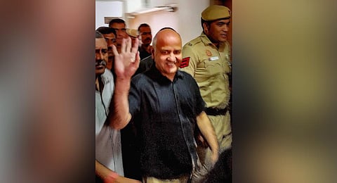 Manish Sisodia being brought to Rouse Avenue Court after the end of the remand period in a money laundering case pertaining to alleged irregularities in the Delhi excise policy, in New Delhi. | PTI