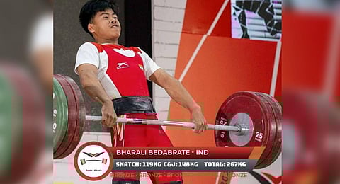 Indian weightlifter Bharali Bedabrate clinched the men's 67kg bronze medal at the International Weightlifting Federation World Youth Championships in Durres, Albania. (Photo | IWF Twitter)