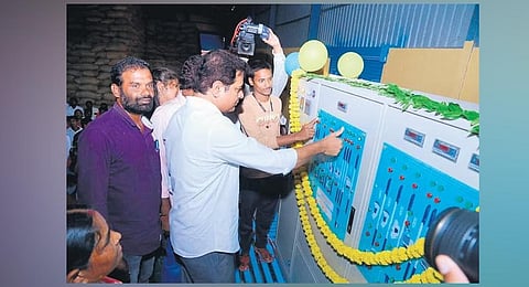 MAUD Minister KT Rama Rao inugurates rice mill established under Dalit Bandhu scheme at Dumala in Yellareddipet in Rajanna-Sircilla district on Monday