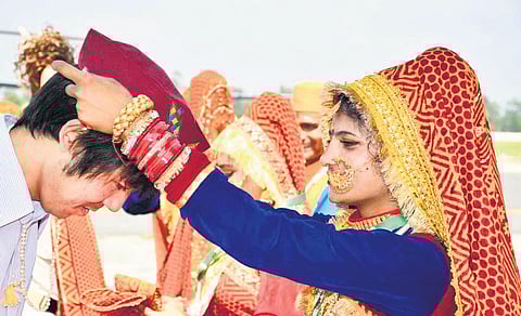 G-20 delegates from 17 countries were given traditional welcome on their arrival in Pant Nagar airport in Uttarakhand on Tuesday| Express