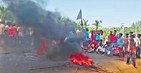 Members of the Banjara community block Shivamogga-Shikaripura highway near Kunchenahalli on Tuesday | Express