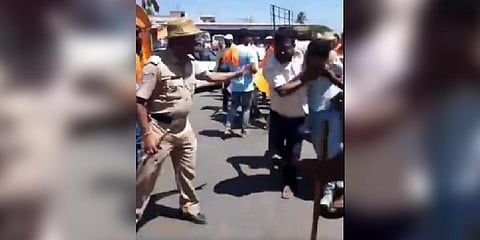 Police taking Sakib Pasha, who allegedly raised the slogans, into custody. (Photo | Twitter)