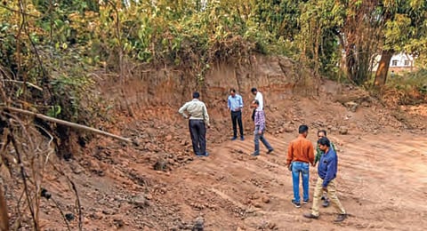 ASI officials inspecting a part of Sisupalgarh moat wall that has been illegally dug up by miscreants at Old Town in Bhubaneswar | DEBADATTA MALLICK