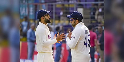 Indian captain Rohit Sharma with teammate Virat Kohli during the third day of the 3rd test cricket match between India and Australia, at Holkar Cricket Stadium in Indore on March 3, 2023.