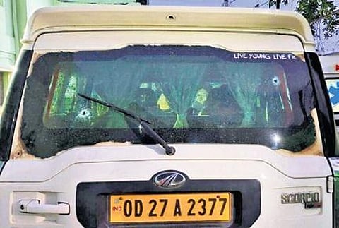 Bullet holes on the vehicle of forest staff | Express