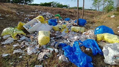 Dumped medical waste along the national highway between Dharmapuri and Pennagaram.