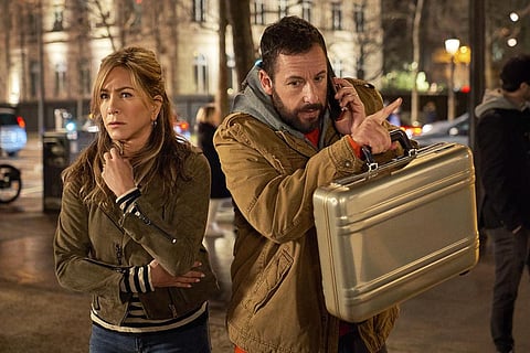 This image released by Netflix shows Jennifer Aniston, left, and Adam Sandler in a scene from the film 'Murder Mystery 2.' (Photo | AP)