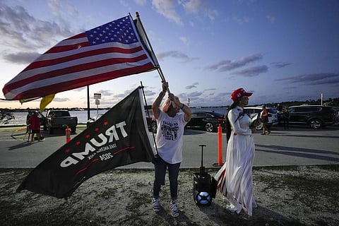 People show their support for former President Donald Trump after the news broke that Trump has been indicted by a Manhattan grand jury, Thursday, March 30 (Photo | AP)