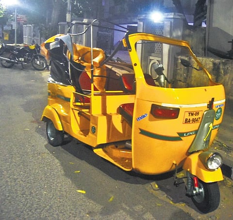 The accident took place near a private chit fund office on North Boag Road. (Left) The uprooted tree being cleared on Saturday | MArtin louis