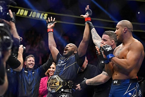 Jon Jones, center, celebrates after defeating Ciryl Gane in a UFC 285 mixed martial arts heavyweight title bout Saturday, March 4, 2023, in Las Vegas (Photo | AP)