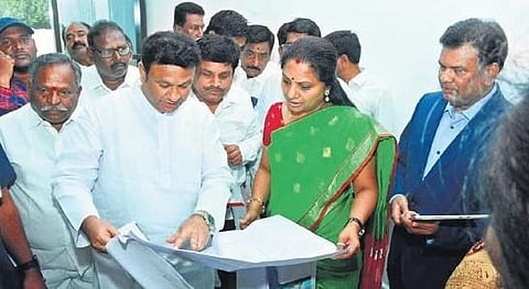  MLC K Kavitha along with BRS leaders and officials examines the blueprint of the IT-Hub in Nizamabad on Saturday 
