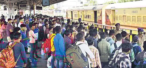 For representational purpose, Migrant workers at Coimbatore railway station, waiting for train to their native places.(Photo | S Senbagapandiyan)