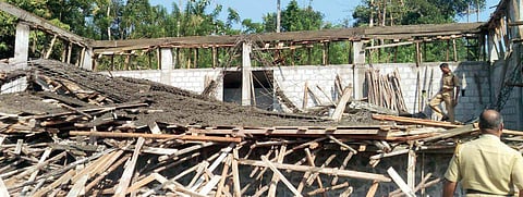 In this January, 2018 image, firemen inspect the accident site at Puttingal temple premises in Paravur, Kerala. (File Photo | EPS)