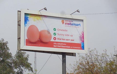 Swiggy's egg ad billboard for Holi. (Photo | Twitter)