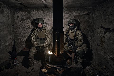 Ukrainian volunteer soldiers rest in a shelter on their positions close to Bakhmut, in Donetsk region, Wednesday, March 8, 2023. (Photo | AP)