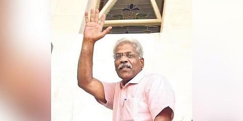  Chief minister’s additional private secretary C M Raveendran waving at journalists while entering the ED office in Kochi on Tuesday | A Sanesh 