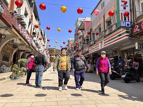 Tourists were seen walking on the street in the shopping district on Nangan, part of Matsu Islands, Taiwan on Tuesday, March 7, 2023. (Photo | AP)