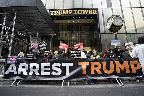 Protesters gather outside Trump Tower on Friday, March 31, 2023, in New York. (Photo | AP)