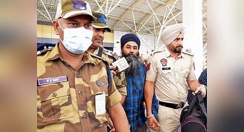 Radical preacher Amritpal Singh's close aide Papalpreet Singh, who was arrested by Punjab Police on Monday, being taken to Dibrugarh prison, on April 11, 2023. (Photo | PTI)
