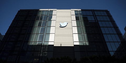 A Twitter logo hangs outside the company's San Francisco offices on Tuesday, Nov. 1, 2022. (File Photo | AP)