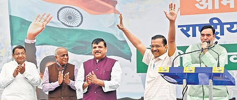 AAP’s national convenor Arvind Kejriwal with colleagues at the party headquarters in New Delhi on Tuesday | Shekhar yadav
