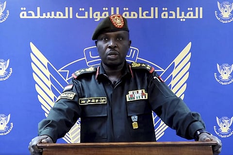 Sudanese Armed Forces Brig. Nabil Abdullah reads a statement warning of conflict in a video. (Photo | AP)